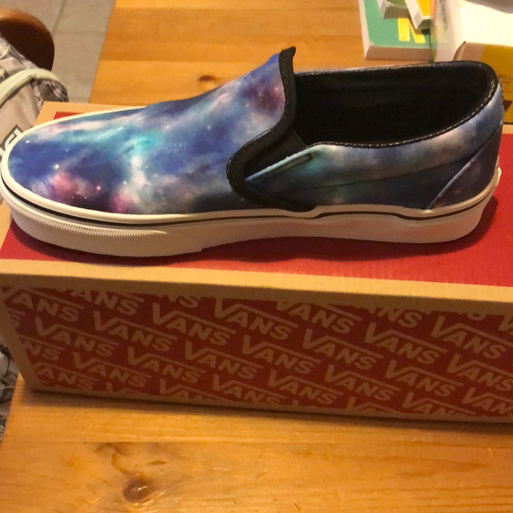Women’s size 7 Vans slip on sneakers galaxy.